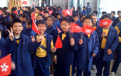 Cantonese kids waving flags, Image Credit: jonrawlinson on flickr