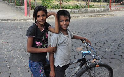 Mexican kids on a bike, photo credit permanently scatterbrained on Flickr