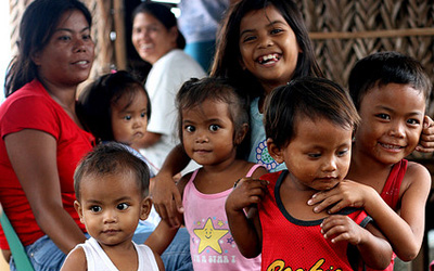 Fillipino kids smiling, photo credit Rain Rannu on Flickr